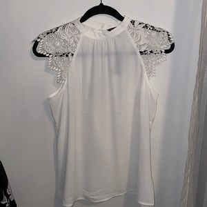 White sleevess top